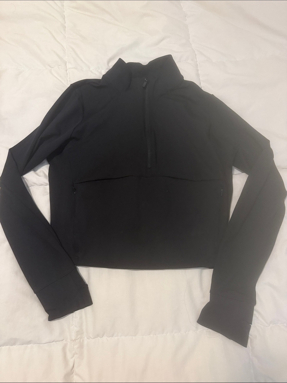 Women’s Black Quarter-Zip Performance Top.